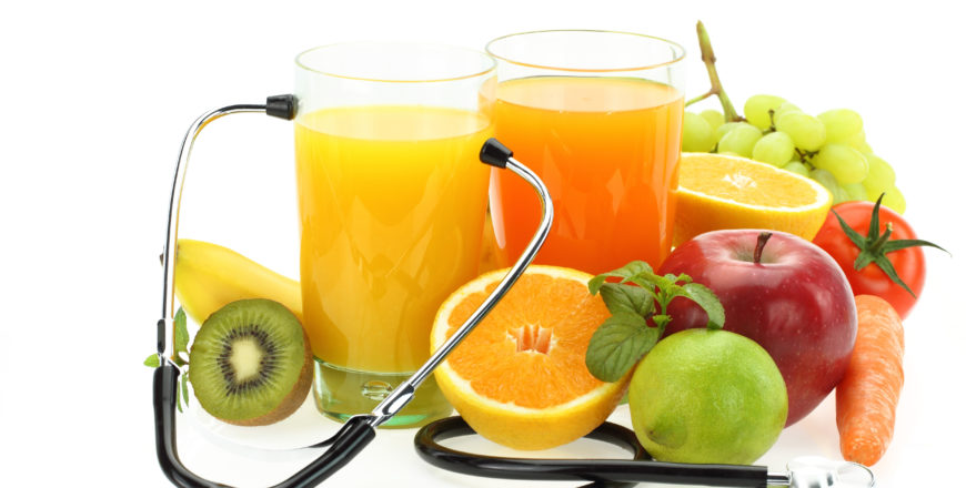 Healthy eating. Fruits, vegetables, juice and stethoscope