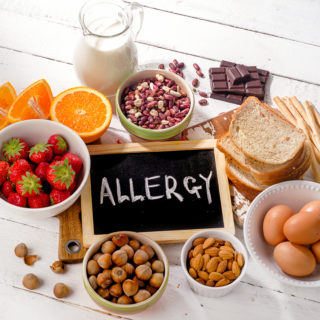 food-allergy-allergic-food-on-wooden-background